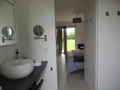 Un ou plusieurs lits dans un hébergement de l'établissement Gîte & Chambres d'Hôtes - Le Petit Bali