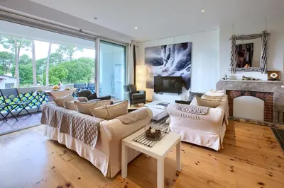 Coin salon dans l'établissement Appartement Pyla Les Cèdres