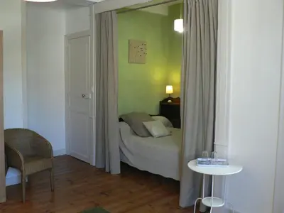Un ou plusieurs lits dans un hébergement de l'établissement La Terrasse de la Grand'Rue - chambre d'hôtes -