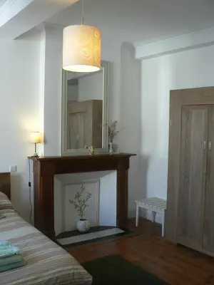 Un ou plusieurs lits dans un hébergement de l'établissement La Terrasse de la Grand'Rue - chambre d'hôtes -