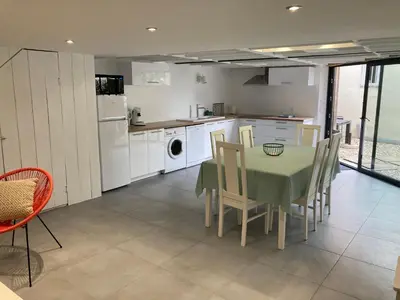 Cuisine ou kitchenette dans l'établissement Les Locations du Bassin Appartements Alexandre
