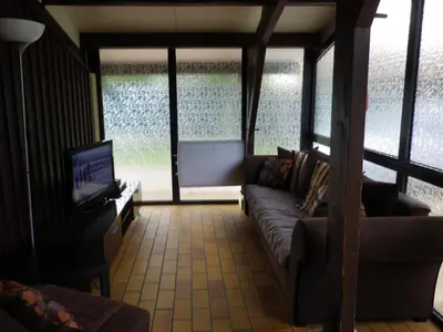 Télévision ou salle de divertissement dans l'établissement Maison Champagne