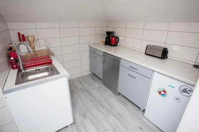 Cuisine ou kitchenette dans l'établissement Villa Sunshine