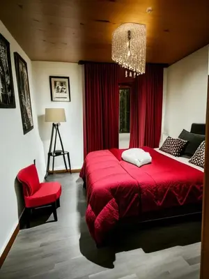 Un ou plusieurs lits dans un hébergement de l'établissement Chambres Du Petit Bonheur