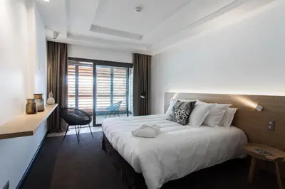 Un ou plusieurs lits dans un hébergement de l'établissement Hôtel & Spa Villa Seren