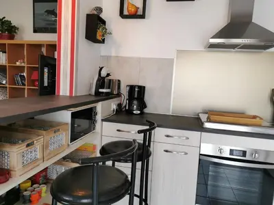 Cuisine ou kitchenette dans l'établissement La Grillotte