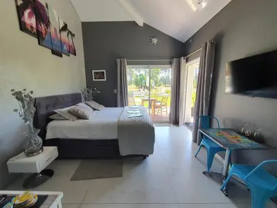 Un ou plusieurs lits dans un hébergement de l'établissement Villa BORA BORA
