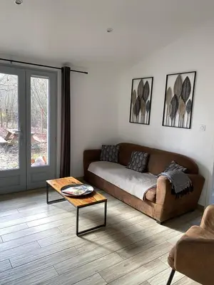Coin salon dans l'établissement Gîtes & Spa de charme 