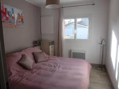 Un ou plusieurs lits dans un hébergement de l'établissement Appartement proche Centre et Arènes