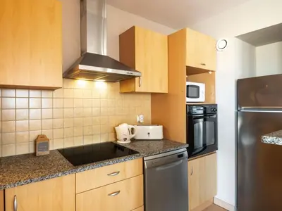 Cuisine ou kitchenette dans l'établissement Apartment Côte Sud-3 by Interhome