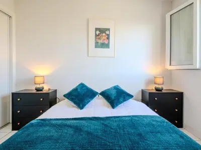 Un ou plusieurs lits dans un hébergement de l'établissement Apartment Grands espaces by Interhome