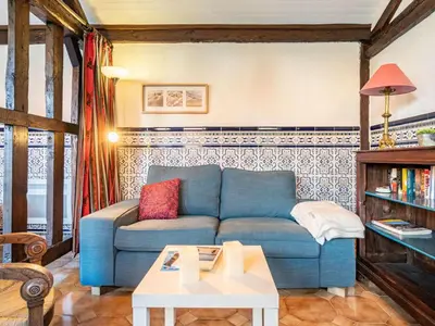 Coin salon dans l'établissement Holiday Home La Poste by Interhome