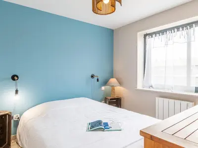 Un ou plusieurs lits dans un hébergement de l'établissement Holiday Home Les Mouettes by Interhome