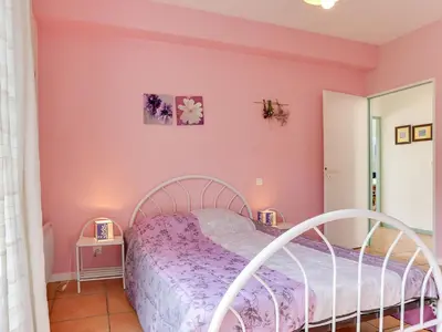 Un ou plusieurs lits dans un hébergement de l'établissement Holiday Home Les Pinasses by Interhome