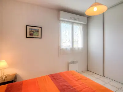 Un ou plusieurs lits dans un hébergement de l'établissement Apartment Maria Callas by Interhome