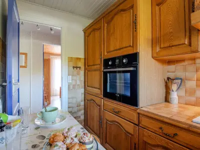 Cuisine ou kitchenette dans l'établissement Holiday Home Oyan Aldo by Interhome