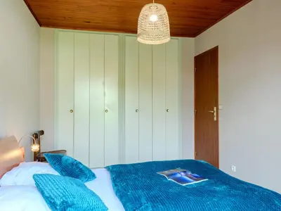 Un ou plusieurs lits dans un hébergement de l'établissement Holiday Home Roitelet by Interhome