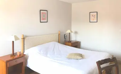 Un ou plusieurs lits dans un hébergement de l'établissement Logis Hôtel & Restaurant Linça
