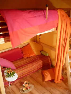 Coin salon dans l'établissement Maison Au Jardin