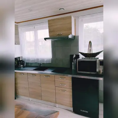 Cuisine ou kitchenette dans l'établissement Le Clos des Mylandes