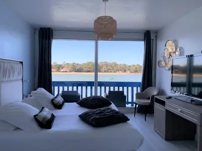 Un ou plusieurs lits dans un hébergement de l'établissement Le Relais Du Lac