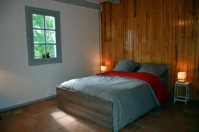 Un ou plusieurs lits dans un hébergement de l'établissement La Maison Ratabou