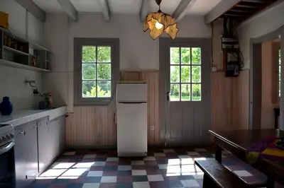 Cuisine ou kitchenette dans l'établissement La Maison Ratabou