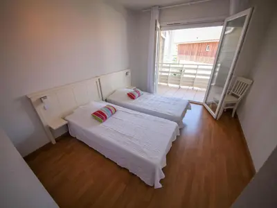 Un ou plusieurs lits dans un hébergement de l'établissement Holiday Home Résidence Indigo II-2 by Interhome