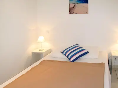 Un ou plusieurs lits dans un hébergement de l'établissement Apartment Résidence Belle Dune-2 by Interhome