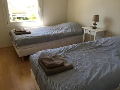 Un ou plusieurs lits dans un hébergement de l'établissement Residence Oceanis