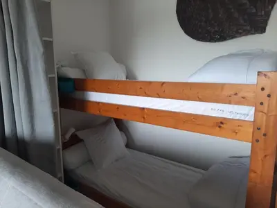 Un ou plusieurs lits dans un hébergement de l'établissement Appartement rénové au 2ème étage, près de la plage à Seignosse - FR-1-239-114