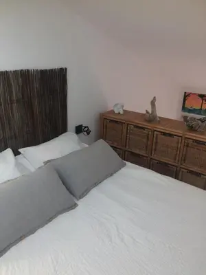 Un ou plusieurs lits dans un hébergement de l'établissement Loft Zen Climatisé