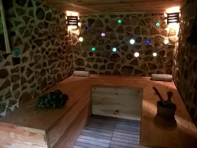 Coin salon dans l'établissement Moulin de Saint Cricq - Gîte insolite