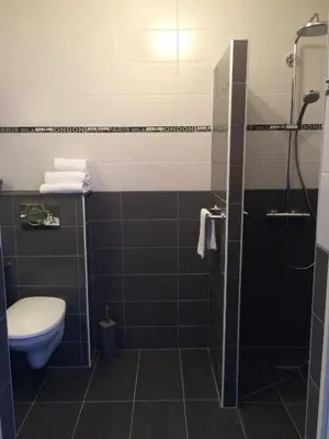 Salle de bains dans l'établissement Hotel Atlantide