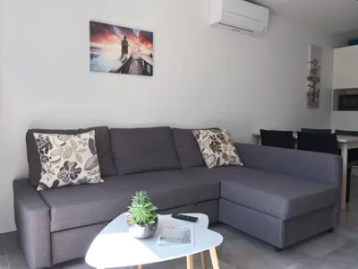 Coin salon dans l'établissement L'appartement des deux chênes