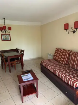 Coin salon dans l'établissement Appartement dans résidence de vacances