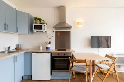 Cuisine ou kitchenette dans l'établissement Point d'Or