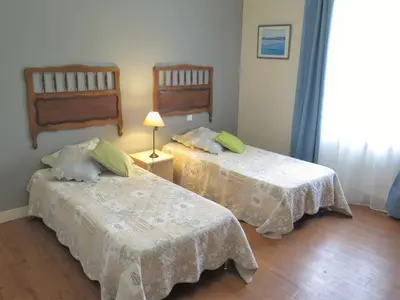 Un ou plusieurs lits dans un hébergement de l'établissement Holiday Home Le Belon by Interhome