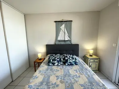 Un ou plusieurs lits dans un hébergement de l'établissement Appartement T2 à Vieux-Boucau, terrasse, animaux admis, parking privé - FR-1-379-33