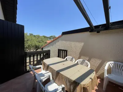 Balcon ou terrasse dans l'établissement Appartement T2 Mezzanine avec Terrasse Proche Lac - Animaux Acceptés ! - FR-1-379-27