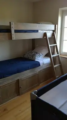 Un ou plusieurs lits dans un hébergement de l'établissement Cottage Narbay