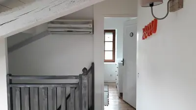 Un ou plusieurs lits dans un hébergement de l'établissement La Belle Landaise 1809 Gîte Arridoulet 2