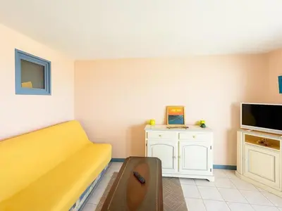 Télévision ou salle de divertissement dans l'établissement Appartement 1 chambre, 2 cabines - 4 pers - Vue océan - FR-1-379-80