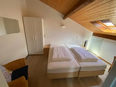 Un ou plusieurs lits dans un hébergement de l'établissement Village Océlandes