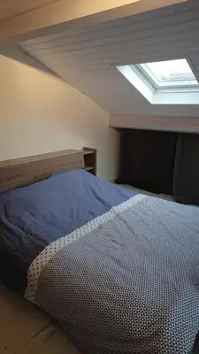 Un ou plusieurs lits dans un hébergement de l'établissement Maison ocelandes