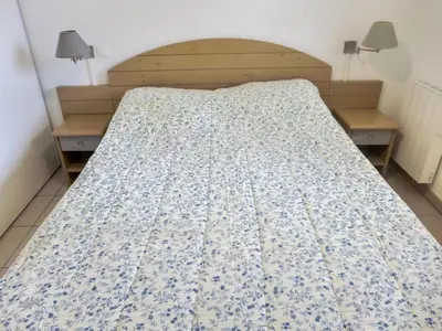 Un ou plusieurs lits dans un hébergement de l'établissement Apartment l'Allée des Dunes-9 by Interhome