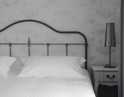 Un ou plusieurs lits dans un hébergement de l'établissement L auberge de la pointe