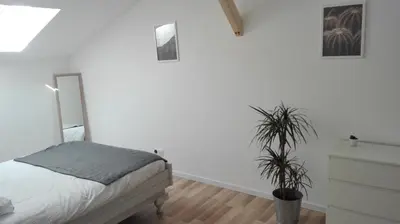 Un ou plusieurs lits dans un hébergement de l'établissement Maison moderne proche lac et plage