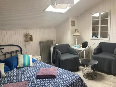 Coin salon dans l'établissement Entre Mer et Pins