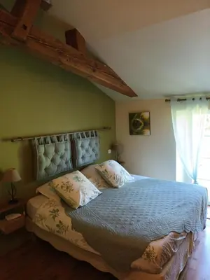 Un ou plusieurs lits dans un hébergement de l'établissement Chambre d'Hôtes L'Airial